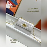 # KK0069#MISS CARO Мини-сумочка из черной кожи с крупным плетеным узором.