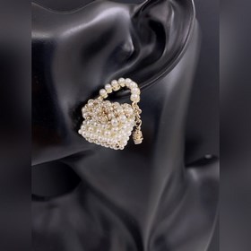 Новейшая модель Chanel, серьги виде сумки с жемчужинами, выполнен
