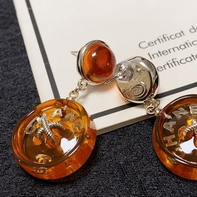 Chanel Милые серьги-гвоздики с оранжевыми пуговицами двойным лог