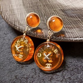 Chanel Милые серьги-гвоздики с оранжевыми пуговицами двойным лог