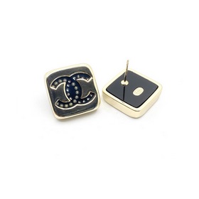 Новейшие серьги Chanel с двойным C из золота и черного цвета. Изг
