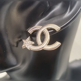 Новейшие серьги Chanel в форме пятиконечной звезды из светло-золо
