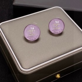 Сережки-гвоздики с фиолетовым кристаллом от Chanel. Новая модель