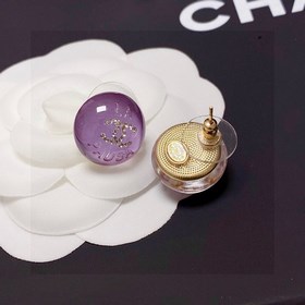 Сережки-гвоздики с фиолетовым кристаллом от Chanel. Новая модель
