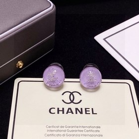 Сережки-гвоздики с фиолетовым кристаллом от Chanel. Новая модель 