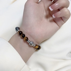 Браслет Chanel с буквами «CC» из натурального тигрового глаза! На