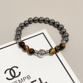 Браслет Chanel с буквами «CC» из натурального тигрового глаза! На