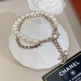 Chanel Элегантный двухслойный браслет с жемчужинами. Украшения