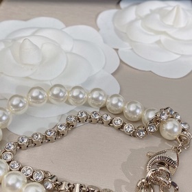 Chanel Элегантный двухслойный браслет с жемчужинами. Украшения 