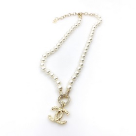 Новейшее колье Chanel Pearl CC из латуни