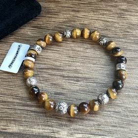 Специальная версия Chrome Hearts с тигровым глазом и множеством э