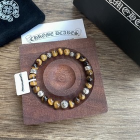 Специальная версия Chrome Hearts с тигровым глазом и множеством э