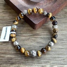 Специальная версия Chrome Hearts с тигровым глазом и множеством э
