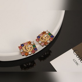 Серьги Gucci из серии Double G с жемчугом и цветными бриллиантами