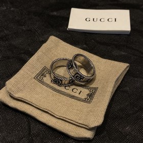 * Кольцо с переплетенными буквами G Серебро с эффектом состариван