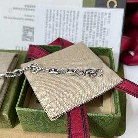Gucci браслет с двойной закрученной буквой G