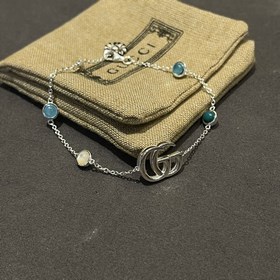 Gucci Браслет с двойным логотипом G из перламутра и камня пато, в