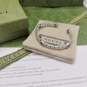 Браслет GUcci с изящной конструкцией виде конской уздечки перепле
