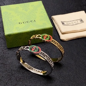 Браслет Gucci с двойным логотипом G. Очень массивный, блестящий,