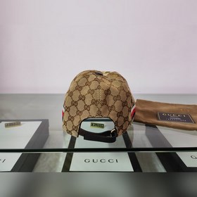 Классическая ткань Gucci подходит для любого времени года. Фотогр