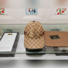 Классическая ткань Gucci подходит для любого времени года. Фотогр