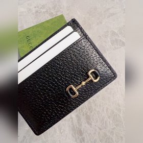Кошелек GG Marmont изготовлен из классической прочной кожи с текс