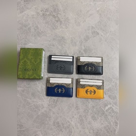 Новейшая модель Gucci — мужской кожаный кошелек с ажурными двойны