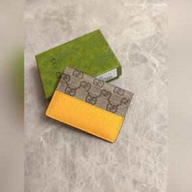 Новейшая модель Gucci — мужской кожаный кошелек с ажурными двойны