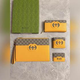 Новейшая модель Gucci — мужской кожаный кошелек с ажурными двойны