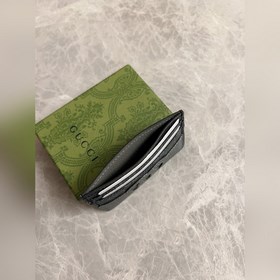 Новейшая модель Gucci — мужской кожаный кошелек с ажурными двойны
