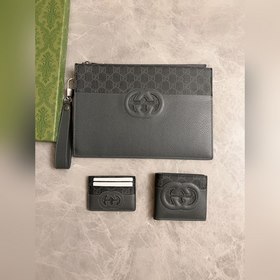 Новейшая модель Gucci — мужской кожаный кошелек с ажурными двойны