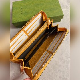 Новейшая модель Gucci — мужской кошелек на молнии с ажурными двой