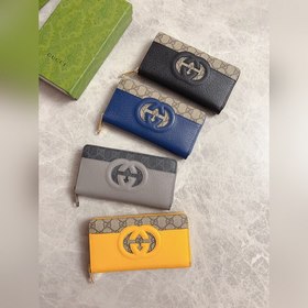 Новейшая модель Gucci — мужской кошелек на молнии с ажурными двой