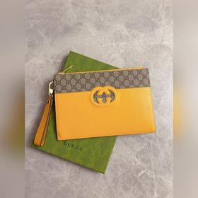 Новейшая мужская сумка Gucci украшена ажурными переплетенными дво