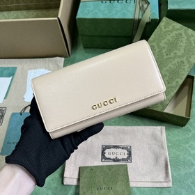 Длинный кошелек с логотипом Gucci, выполненным рукописным шрифтом