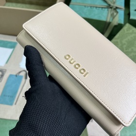 Длинный кошелек с логотипом Gucci, выполненным рукописным шрифтом