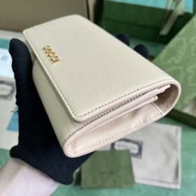 Длинный кошелек с логотипом Gucci, выполненным рукописным шрифтом
