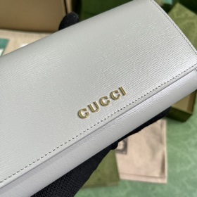 Длинный кошелек с логотипом Gucci, выполненным рукописным шрифтом