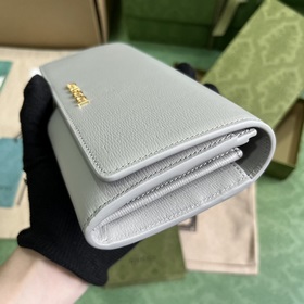 Длинный кошелек с логотипом Gucci, выполненным рукописным шрифтом