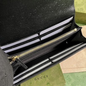 Длинный кошелек с логотипом Gucci, выполненным рукописным шрифтом