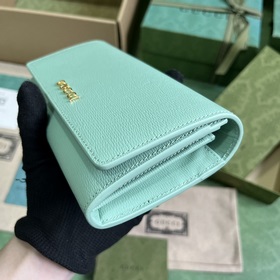 Длинный кошелек с логотипом Gucci, выполненным рукописным шрифтом