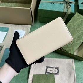 Длинный кошелек с логотипом Gucci, выполненным рукописным шрифтом