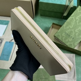 Длинный кошелек с логотипом Gucci, выполненным рукописным шрифтом