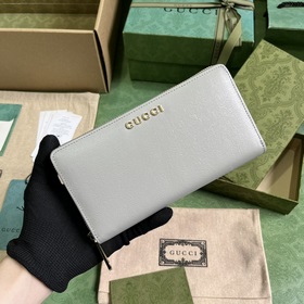 Длинный кошелек с логотипом Gucci, выполненным рукописным шрифтом