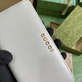 Длинный кошелек с логотипом Gucci, выполненным рукописным шрифтом