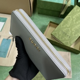 Длинный кошелек с логотипом Gucci, выполненным рукописным шрифтом