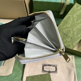 Длинный кошелек с логотипом Gucci, выполненным рукописным шрифтом