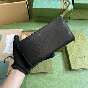 Длинный кошелек с логотипом Gucci, выполненным рукописным шрифтом