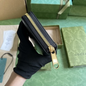 Длинный кошелек с логотипом Gucci, выполненным рукописным шрифтом