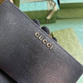 Длинный кошелек с логотипом Gucci, выполненным рукописным шрифтом